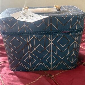 Chic Blue Makeup Case with Gold Accents